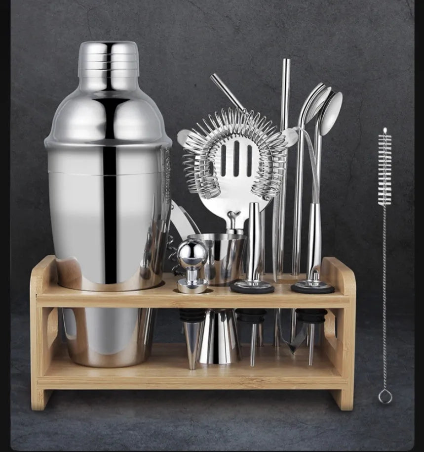 23-piece stainless steel and acrylic European style cocktail set on a bar