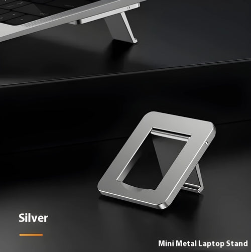 Silver aluminium folding laptop bracket showing compact 4.8cm x 3.5cm dimensions with adhesive backing