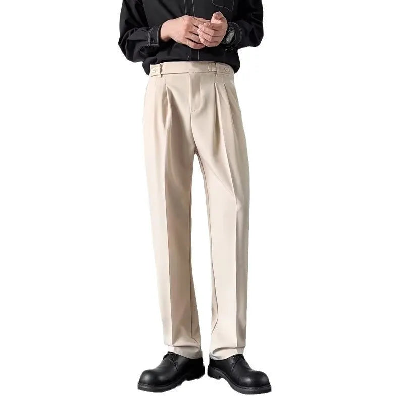 Men's apricot and black loose straight-leg suit trousers on hanger with size tags