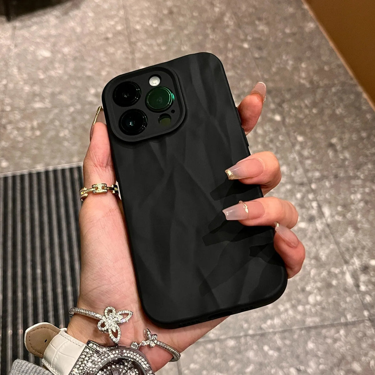 Advanced Skin Wrinkled Silicone Phone Case for iPhone 15 14 13 12 in black with textured wrinkle finish