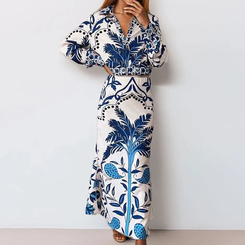 Women's floral print casual co-ord set with long sleeve top and long skirt on a hanger.
