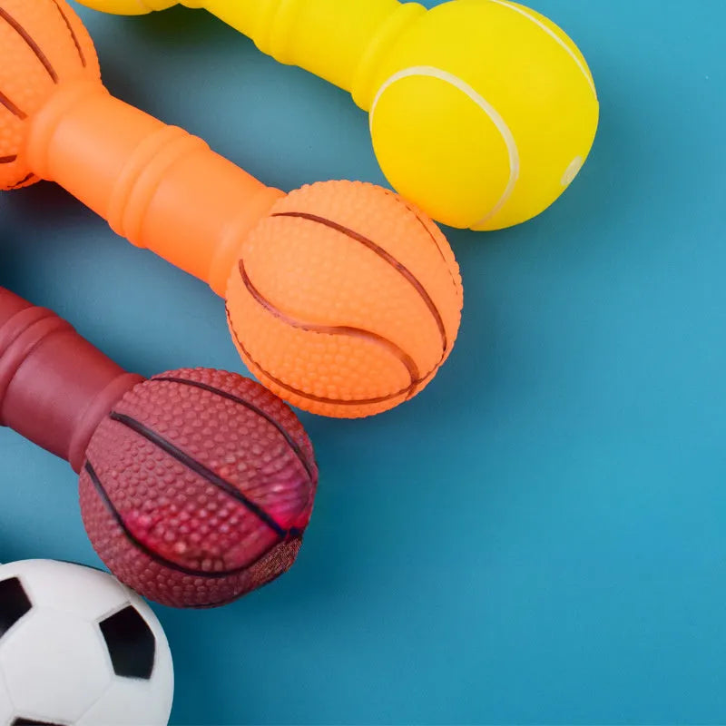 Football dumbbell shaped dog squeaky chew toy in brown, orange, white, and yellow colour options