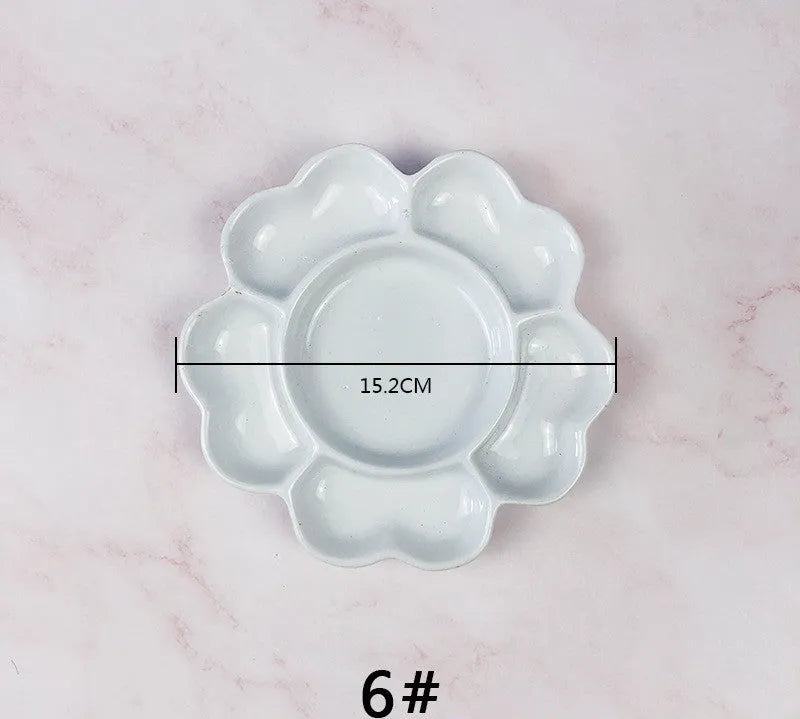 White ceramic plum blossom shaped paint palette for watercolour acrylic oil painting