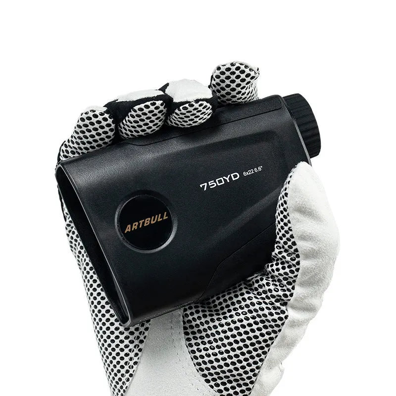 Golf laser rangefinder with LCD display showing distance measurement, USB Type-C charging port visible.