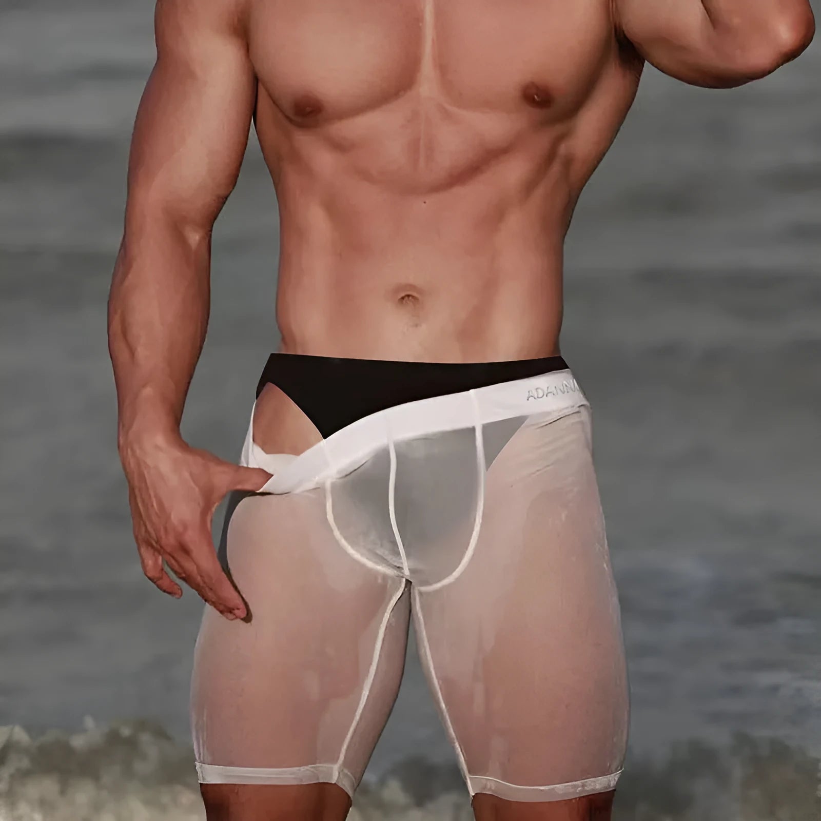 Men's black mesh shorts with seamless design and hip lifting fit