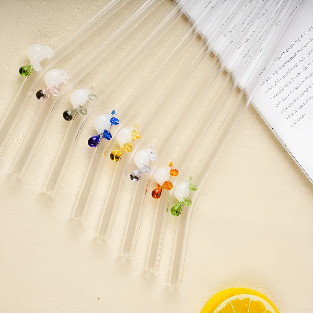 Set of four high borosilicate glass turtle elbow straws in pink green purple and yellow for children