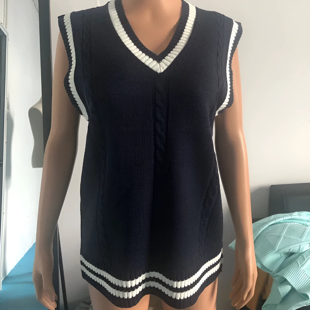 Women's V-neck striped waistcoat sweater in acrylic knit fabric showing slim fit silhouette
