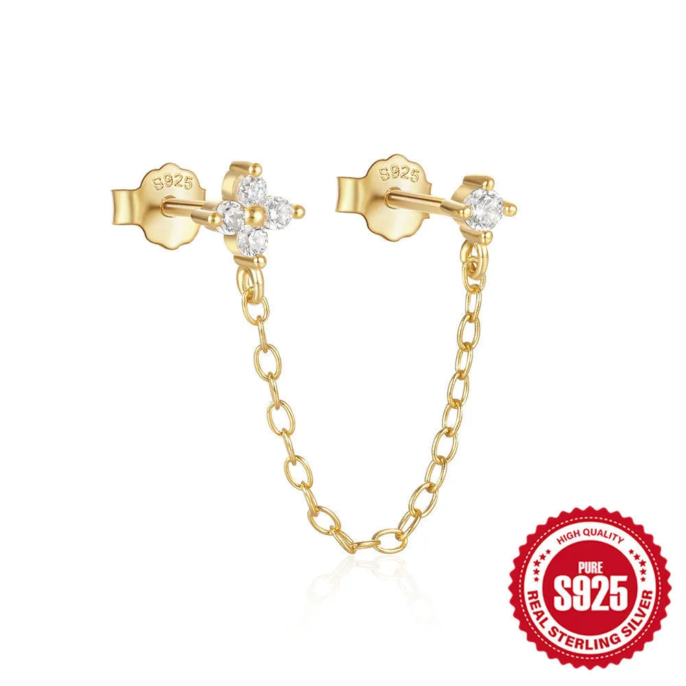 S925 sterling silver geometric drop earring with flower and tassel chain detail in a golden colour.