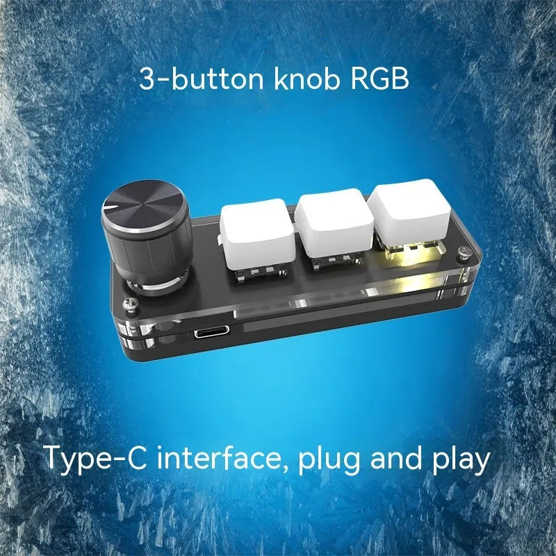 Black and white RGB backlit keypad keyboard with USB cable on desk