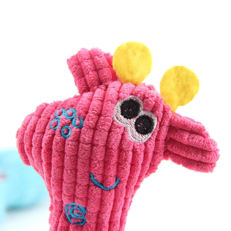Blue deer shaped plush dog toy with corn grain texture on a white background