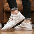 Men's white lace-up casual sneakers with PU leather upper and round toe on a rubber sole.