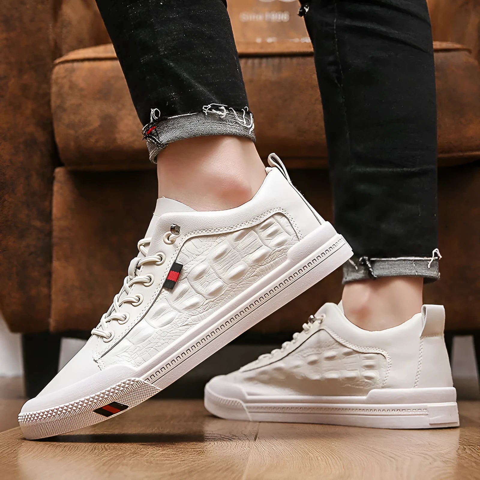 Men's white lace-up casual sneakers with PU leather upper and round toe on a rubber sole.