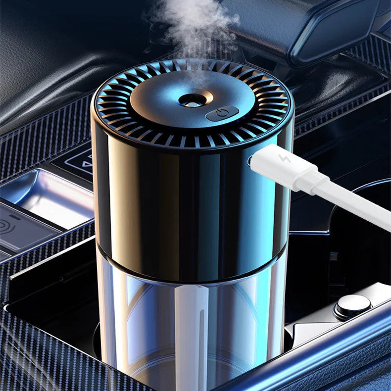 Glass AI spray perfume humidifier on a surface with USB cable, showing classic ocean fragrance option.
