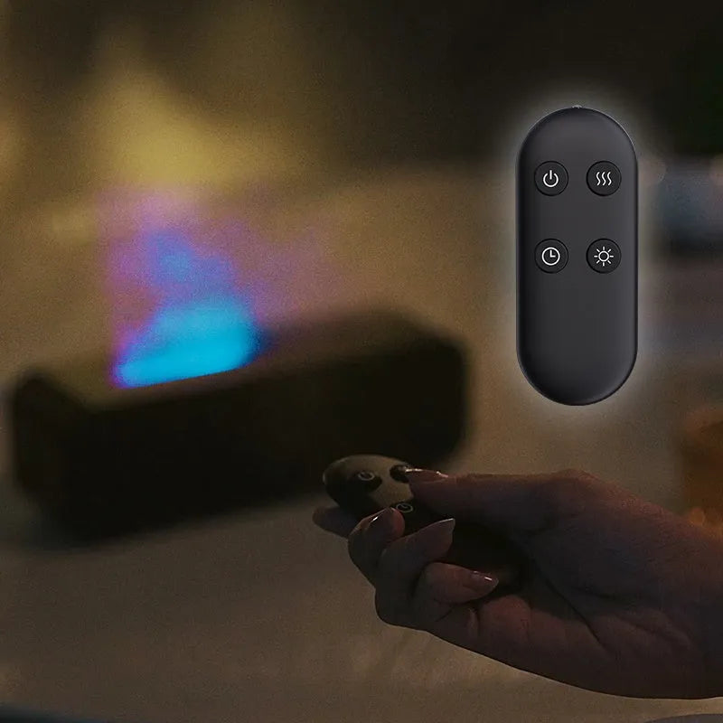 Black and white essential oil diffuser showing flame effect and colour-changing lights with remote control.