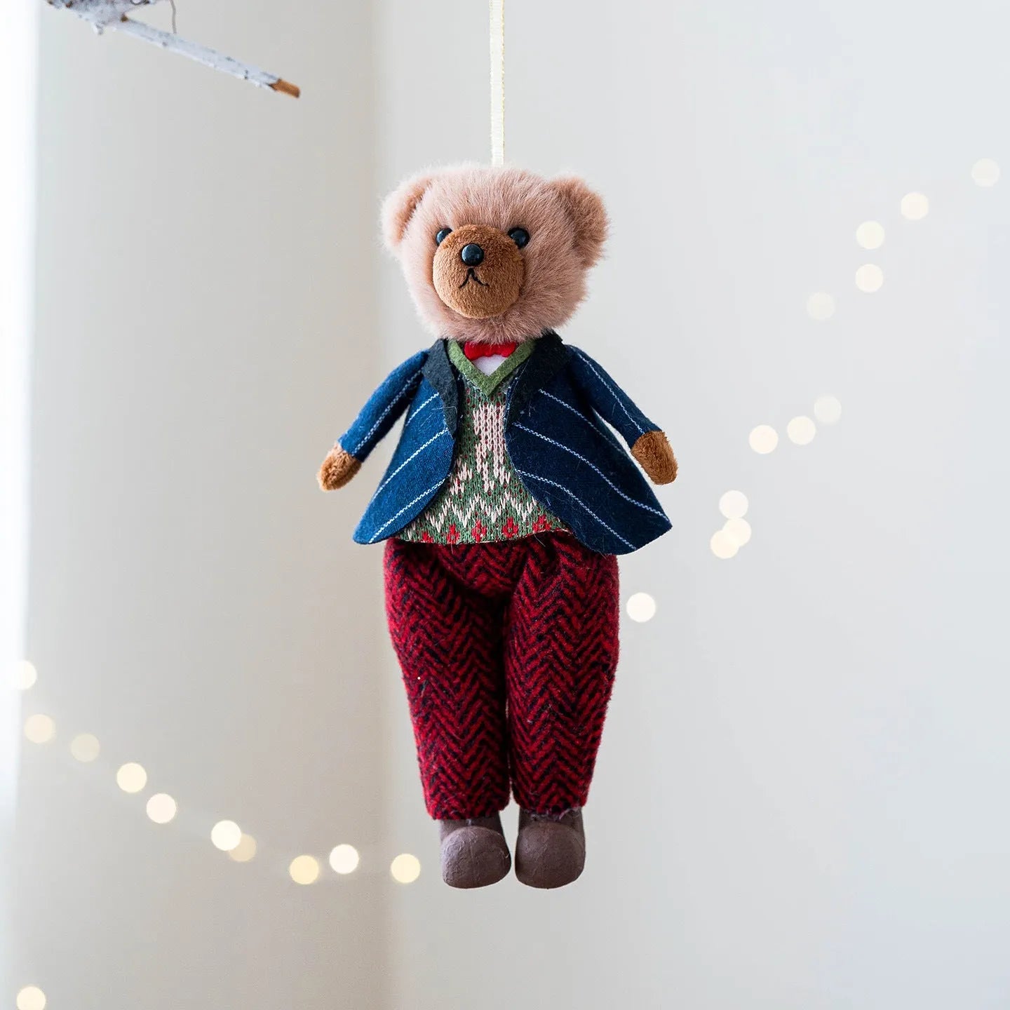 A soft cloth plush bear doll showing two colour options: a princess bear and a gentleman bear with a plaid suit.
