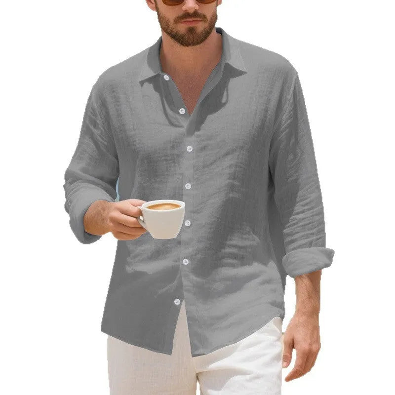 Man's casual linen shirt in loose American style fit, shown in light blue colour.