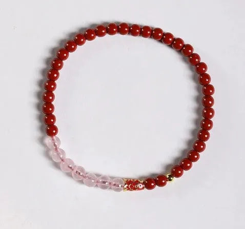 Hand-woven unisex retro Koi bracelet with Purple Gold Sand, Strawberry Quartz, and crystal beads on display