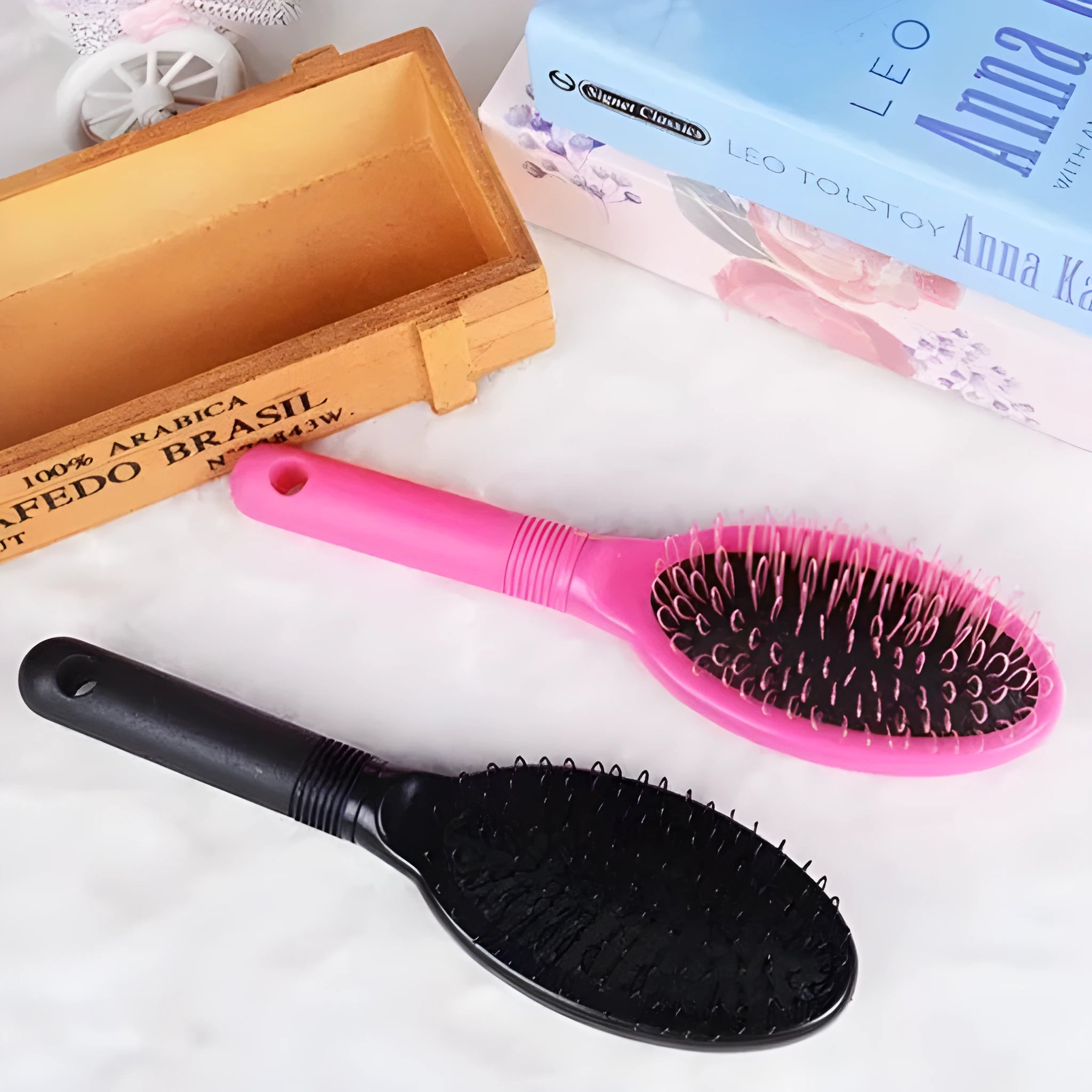 Black ABS plastic airbag comb for hair extensions measuring 22 by 6 centimetres