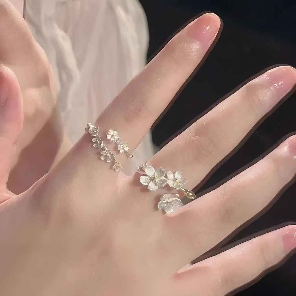 Adjustable open mouth jasmine flower ring with three-dimensional floral design