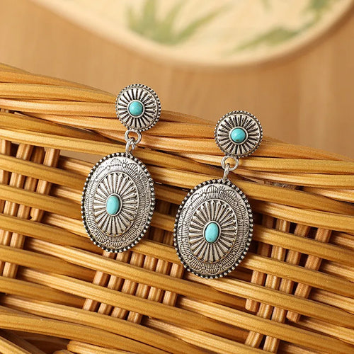 Silver-turquoise alloy drop earrings with retro pumpkin flower design and electroplated finish.