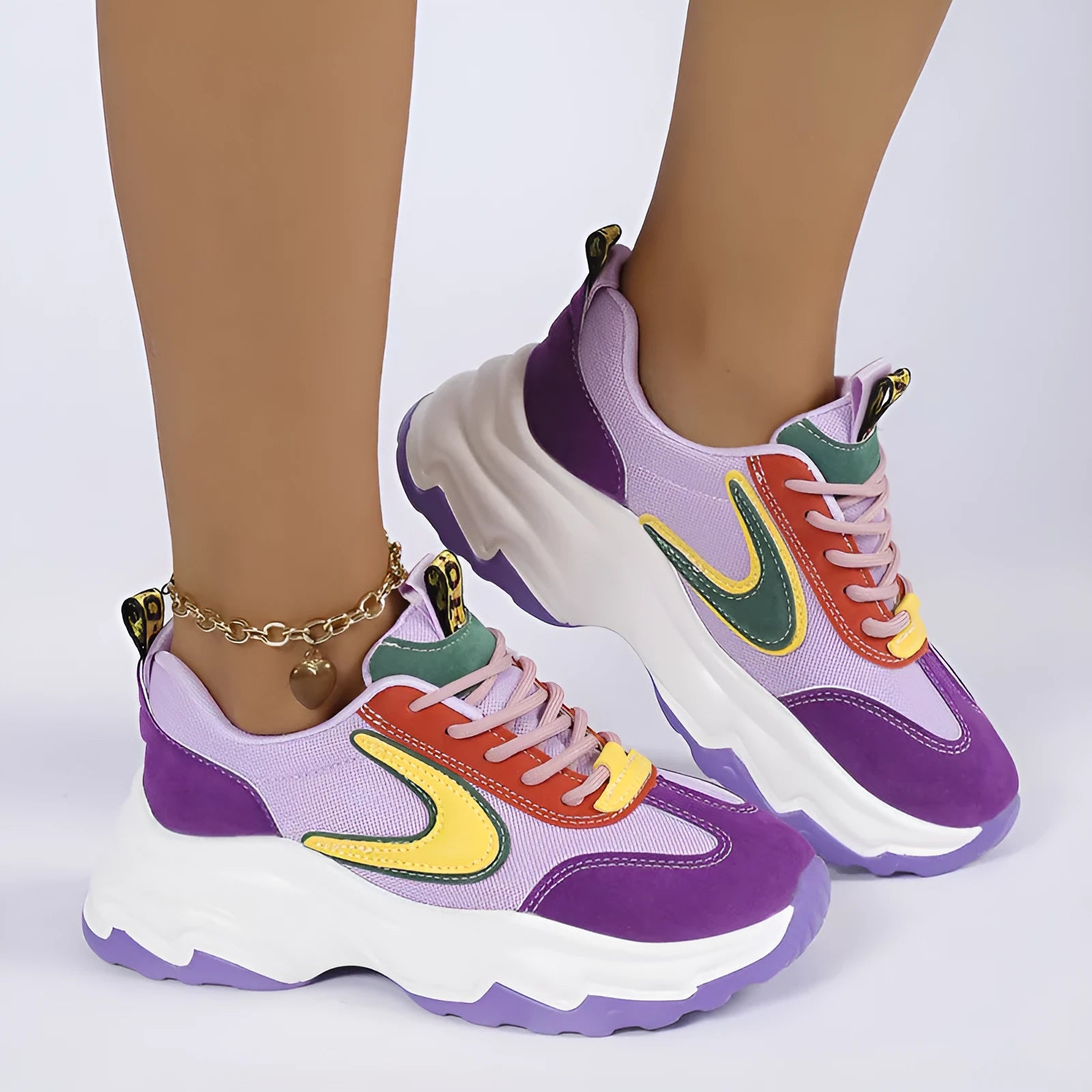 Mixed-colour women's lace-up sneakers with breathable mesh upper, thick rubber sole, and round toe in orange and purple