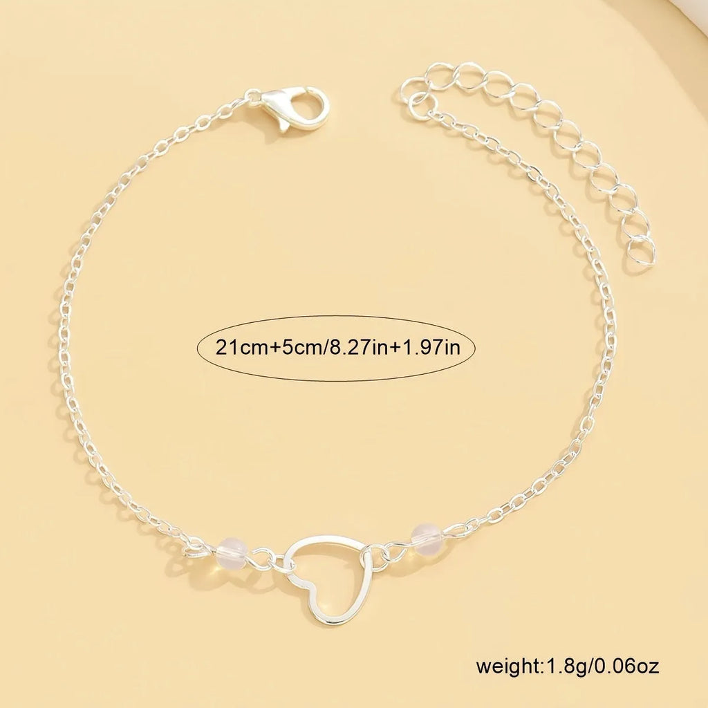 Women's adjustable ankle bracelet with heart-shaped geometric pendant in gold or silver alloy