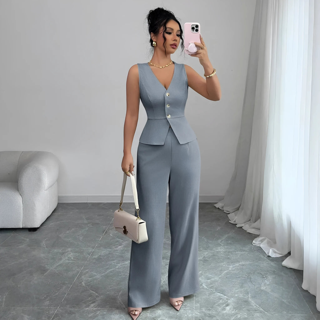 Women's sleeveless vest and high-waist trouser two-piece set in solid colour polyester fabric