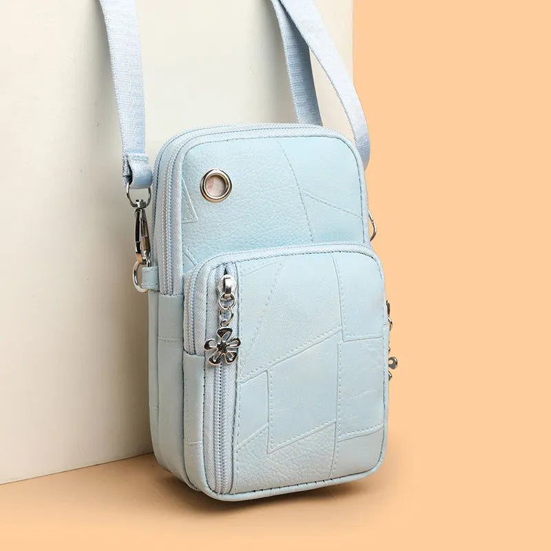 Mini vertical PU phone bag with polyester lining and sandwich pocket in black brown pink water blue