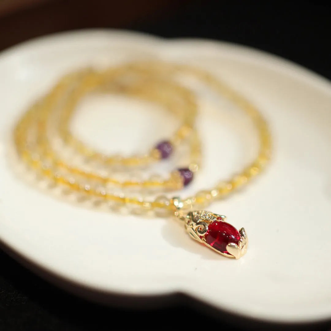 Natural Brazilian gold rutilated quartz bracelet with Chinese style design and hanging chopsticks