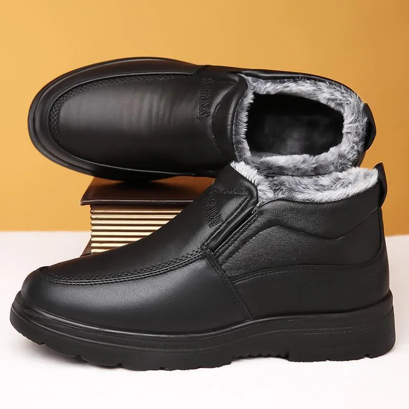 Black and brown fleece-lined men's winter slip-on shoes with a waterproof PU upper and rubber sole.
