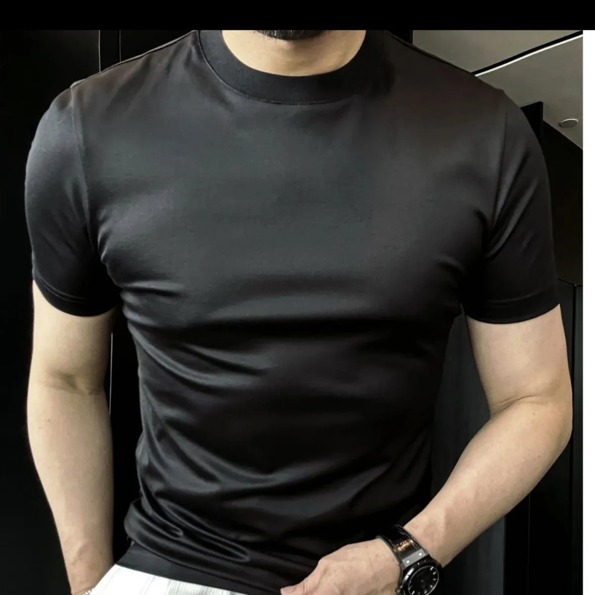 Ice silk soft breathable round neck short sleeve T-shirt in black front view on model