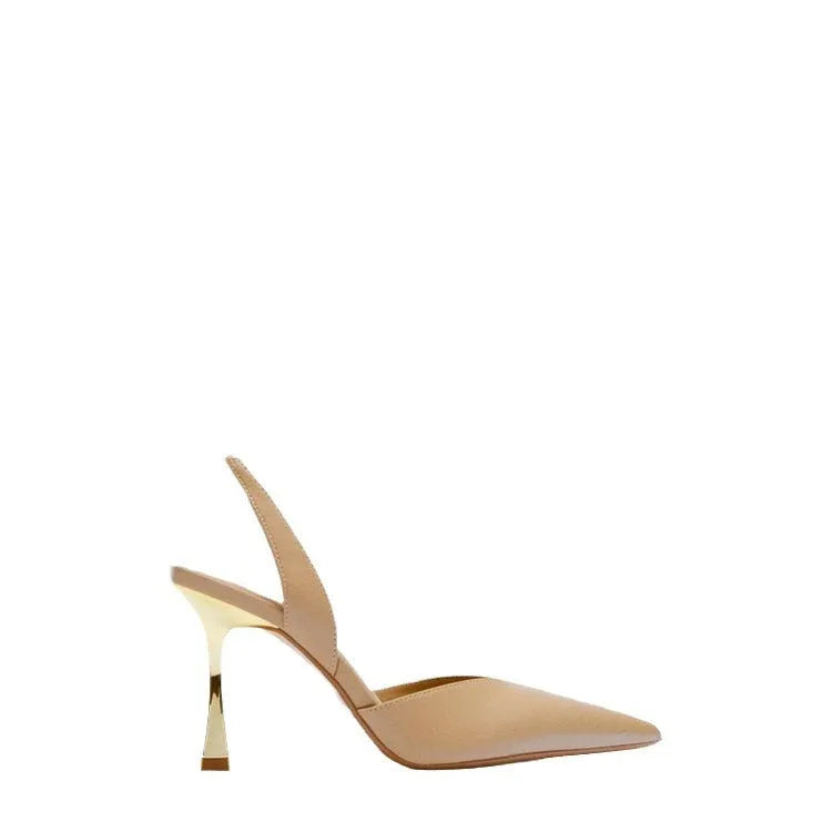 Nude patent leather pointed high heel shoe with shallow mouth, shown in apricot colour.