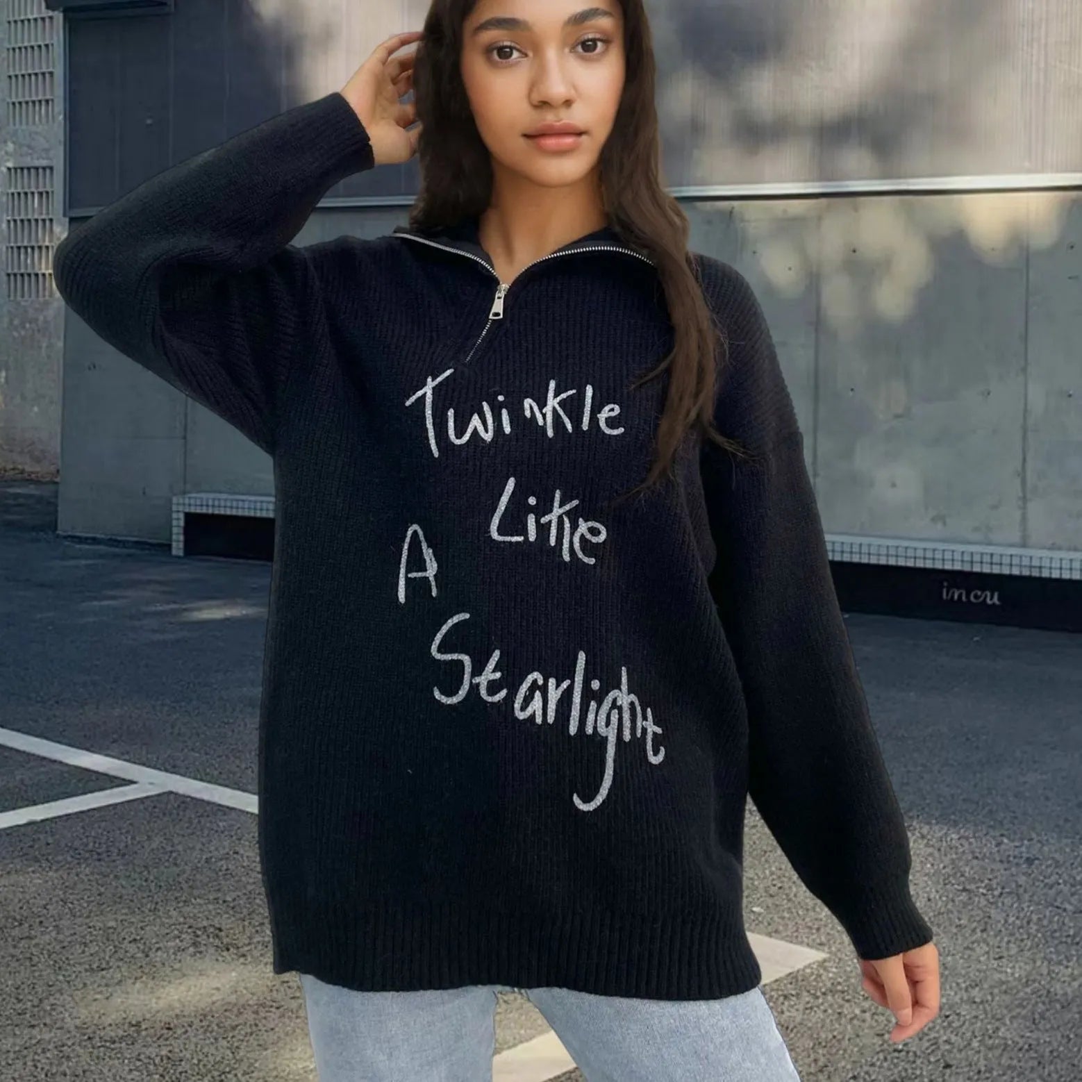 Women's light khaki alpaca fleece pullover sweater with loose lapels and an oblique diagonal zip.