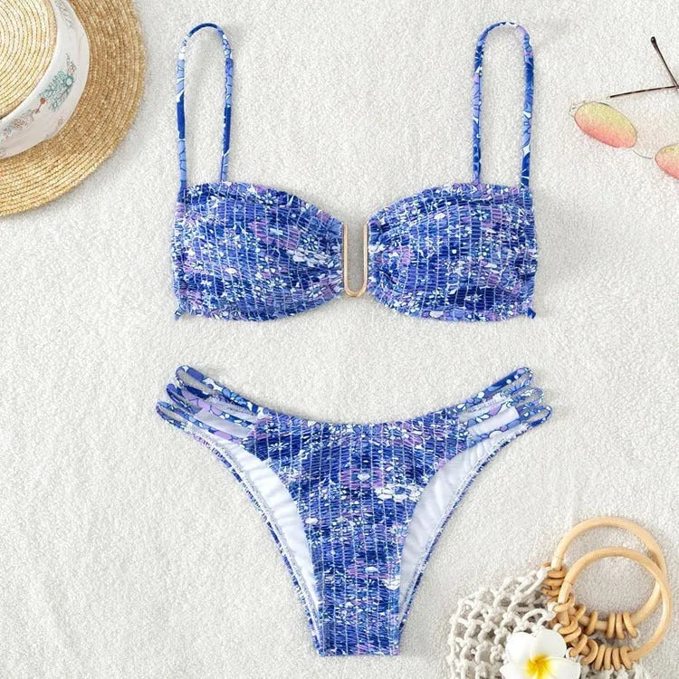 Women's high-waist floral bikini swimsuit in a solid colour on a mannequin