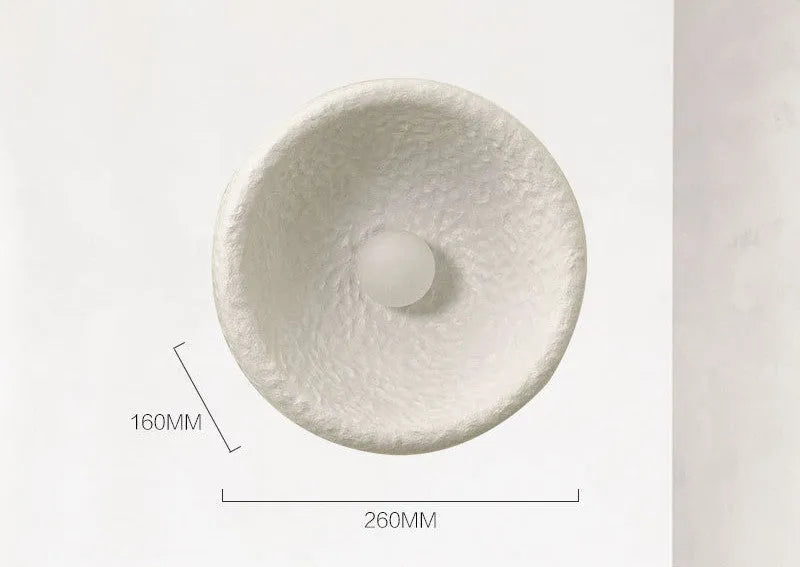 Japanese-style minimalist wall lamp with resin shade in three diameter sizes for modern interiors
