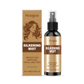 100ml bottle of clear hair care spray with a spray pump, labelled with ingredients.