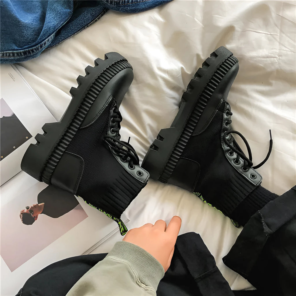 Men's black Dr Martens 8-hole high-top platform boots with a side zipper and frosted leather upper.