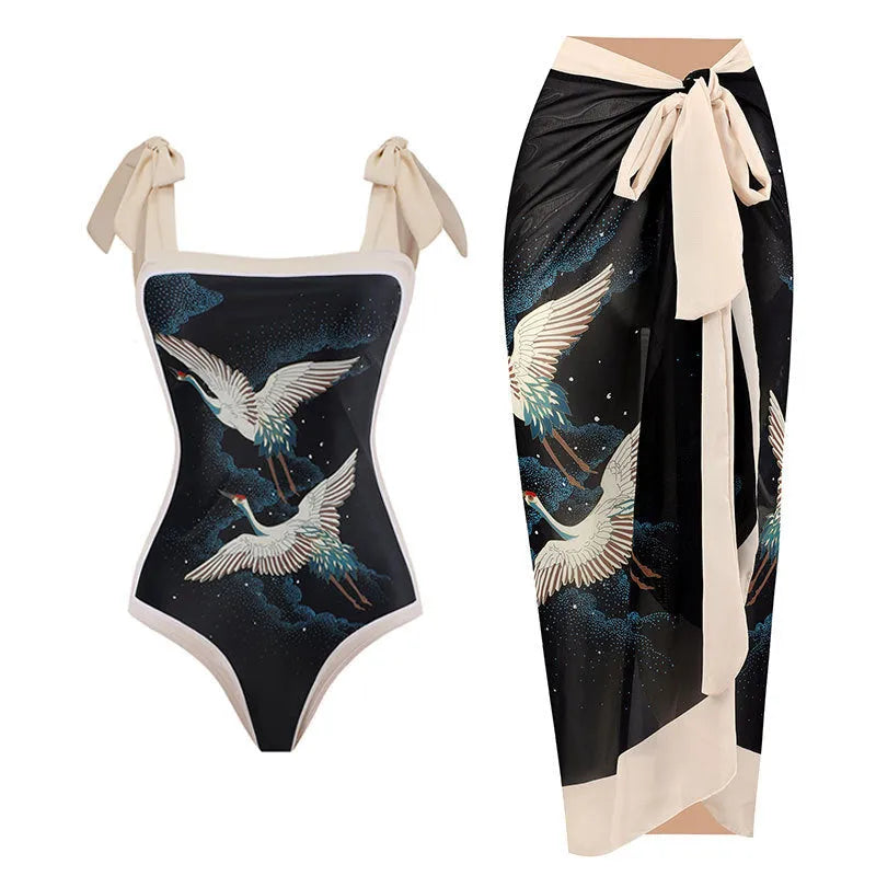 Yellow retro one-piece swimsuit with floral print and a detached black chiffon skirt