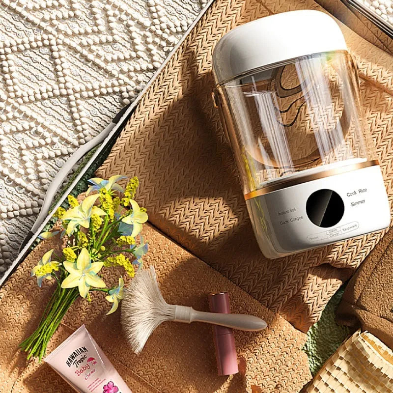 Personal smart electric stew cooker with a transparent Gaopeng glass pot on a fibreglass body.