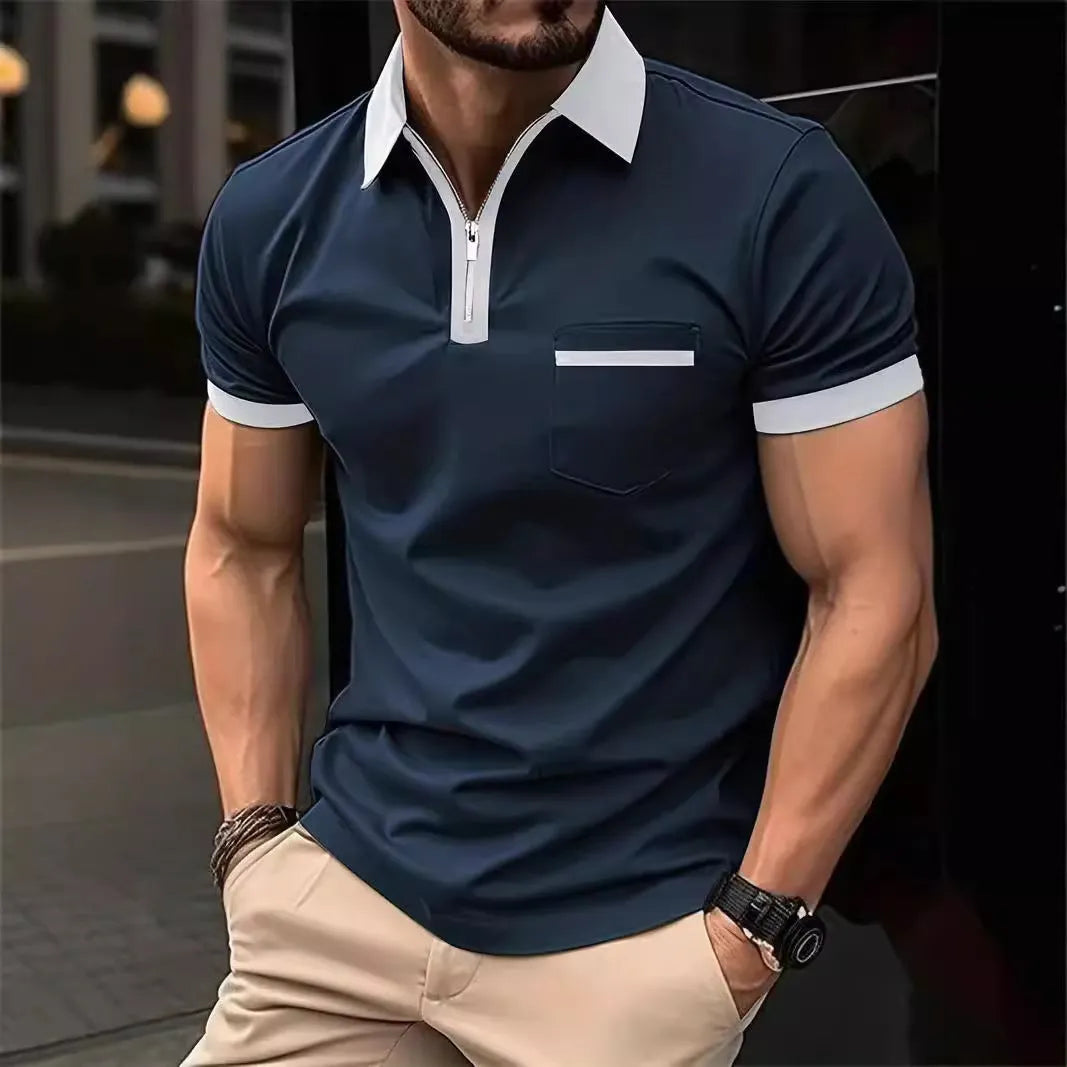 Man wearing a loose-fit casual short-sleeved shirt with a chest pocket and zipper decoration details.