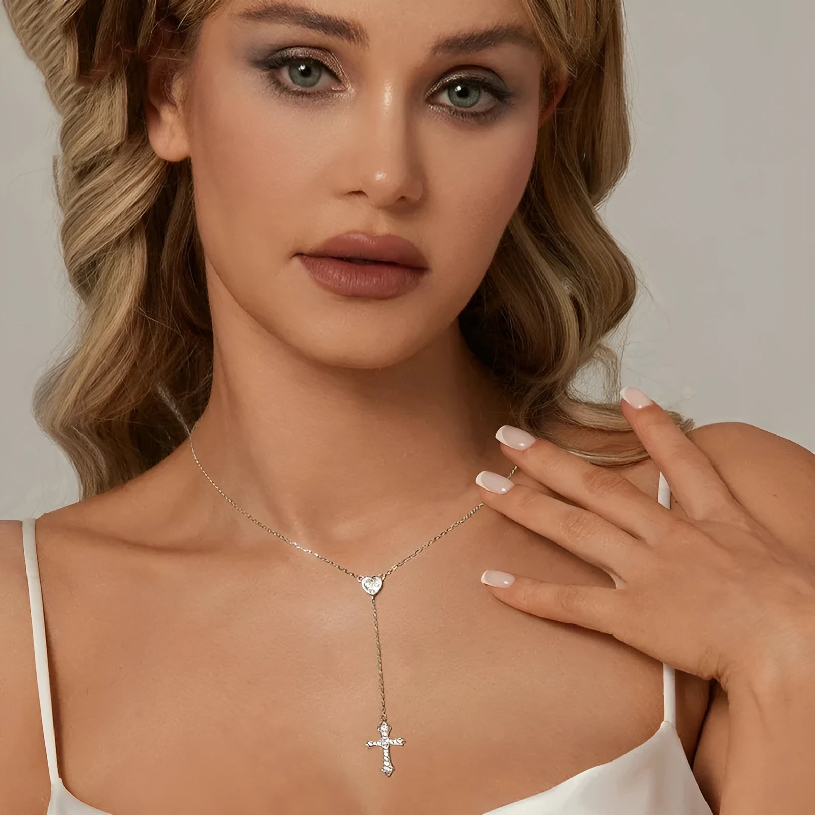 Simple V-neck love cross pendant on a silver O-link chain