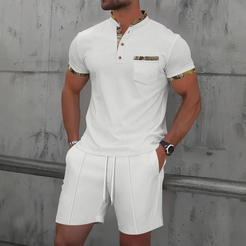 Men's grey waffle texture short sleeve zip-up polo suit with matching shorts laid flat.