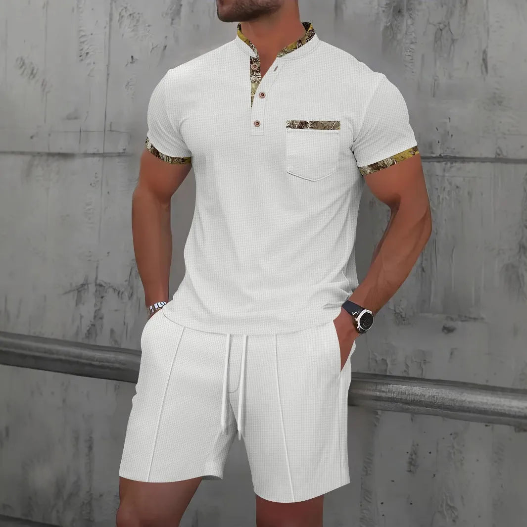 Men's grey waffle texture short sleeve zip-up polo suit with matching shorts laid flat.