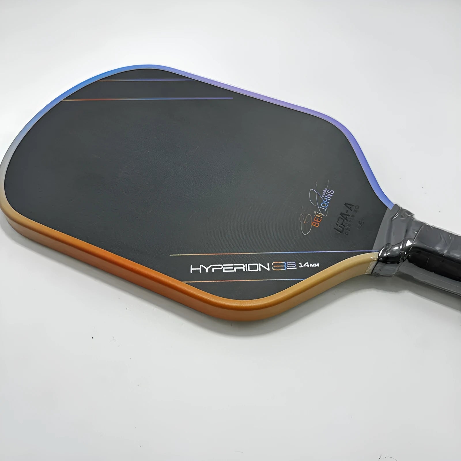 Colour matte pickleball racket with T700 carbon fibre face and honeycomb core construction.