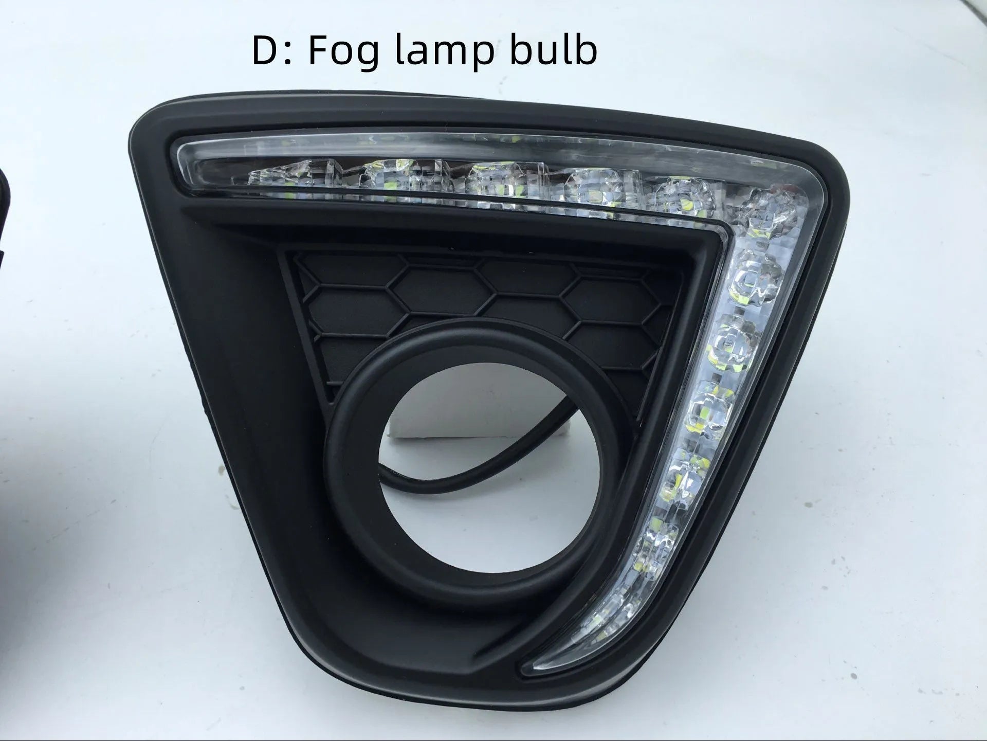 Mazda CX-5 replacement LED daytime running light bulbs with electroplated housing.