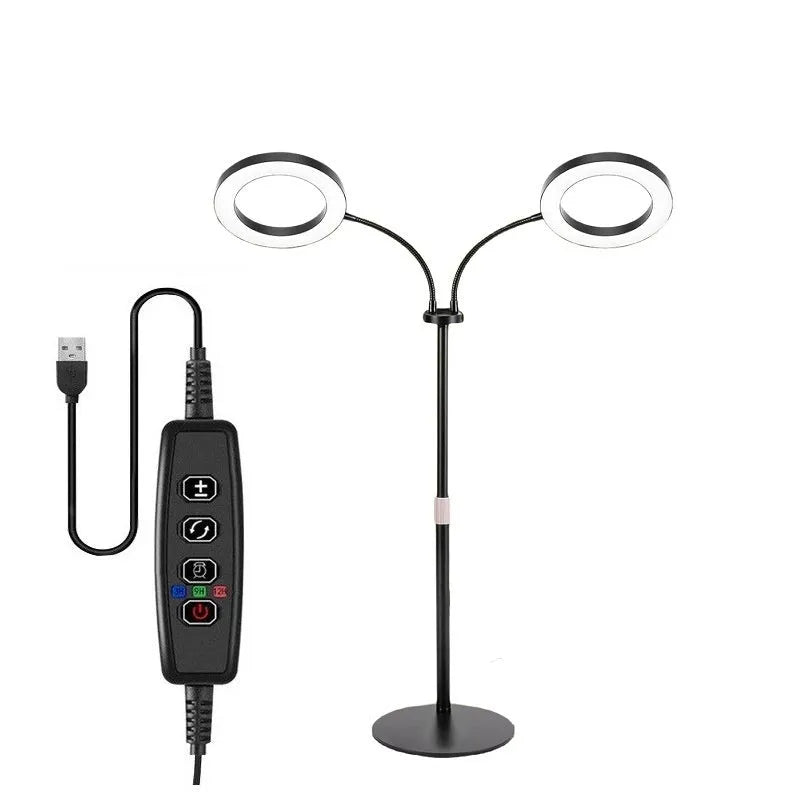 White aluminium alloy retractable floor stand plant grow light with angel ring head positioned over indoor plants.