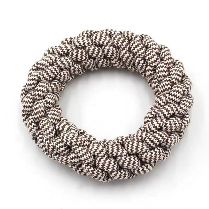 Close-up of a cotton braided ring knot toy for dogs, approximately 18cm diameter, made from cotton thread in a random colour