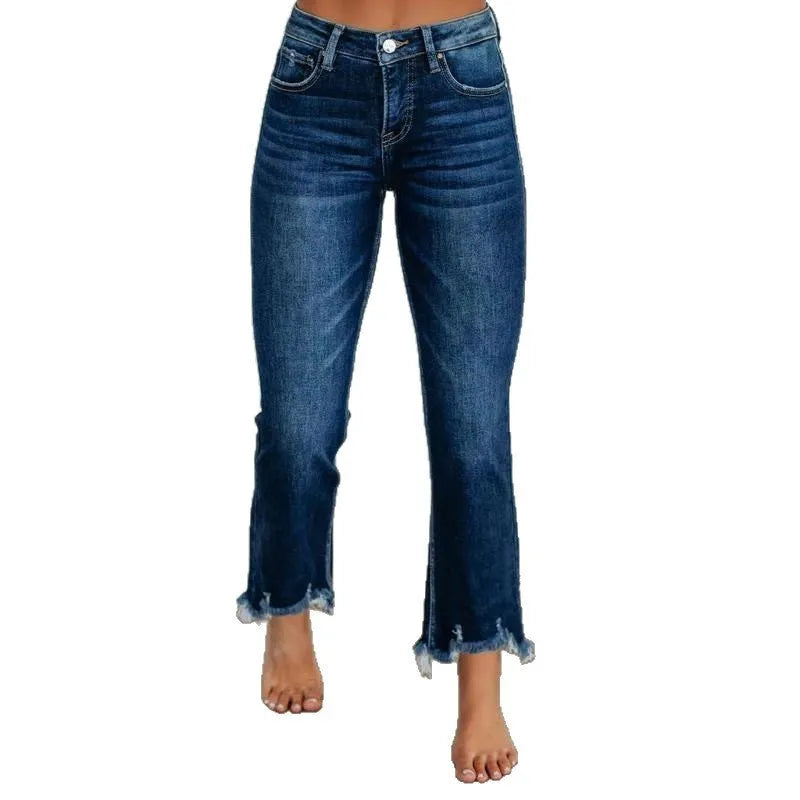 Women's solid dark blue denim casual pants with a hand-worn finish on a hanger.