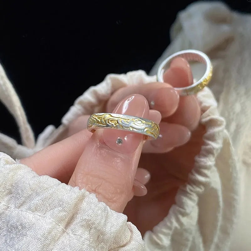 Open-mouth geometric white copper ring with Xiangyun pattern in silver-gold electroplate.