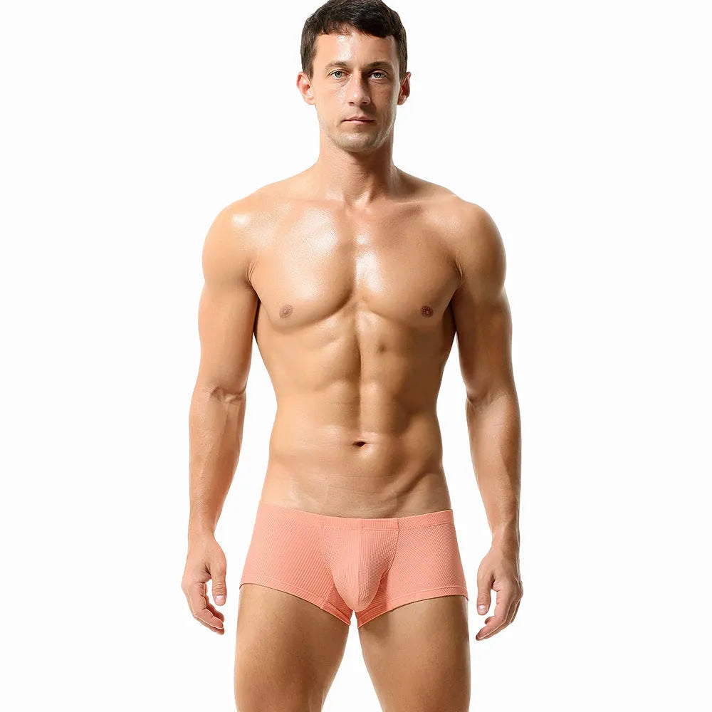 Men's low waist nylon boxers in solid colours including orange red and cloudy blue